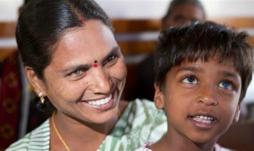 Before surgery photo of Karthik, an 8-year-old corneal transplant recipient who lives near Hyderabad, India. A genetic condition caused blindness in both his eyes. His transplant, at a clinic funded by Seattle-based SightLife, allowed him to see his mother's face for the first time in years.